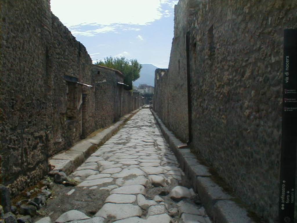 II.1.13 Pompeii. May 2005. Via di Nocera from Via dell Abbondanza looking south.  I.13