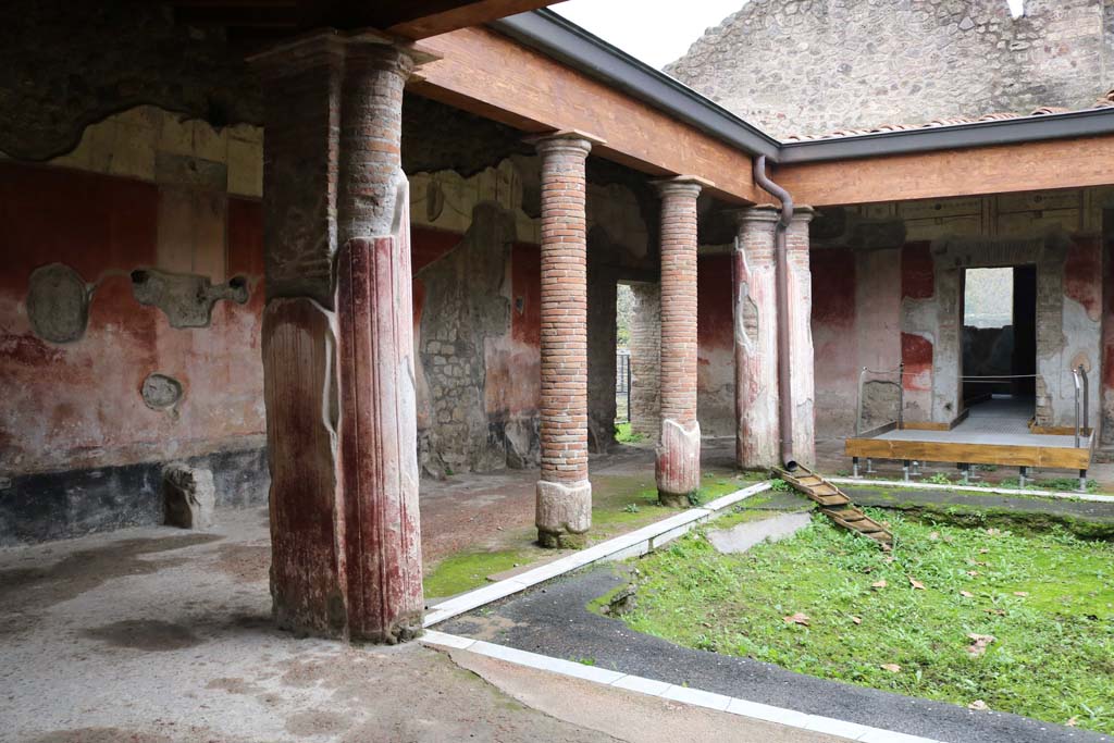 II.4.6 Pompeii. April 2018. 
Looking towards the east side and south-east corner of the portico of the baths, from entrance doorway.
Photo courtesy of Ian Lycett-King. Use is subject to Creative Commons Attribution-NonCommercial License v.4 International.
