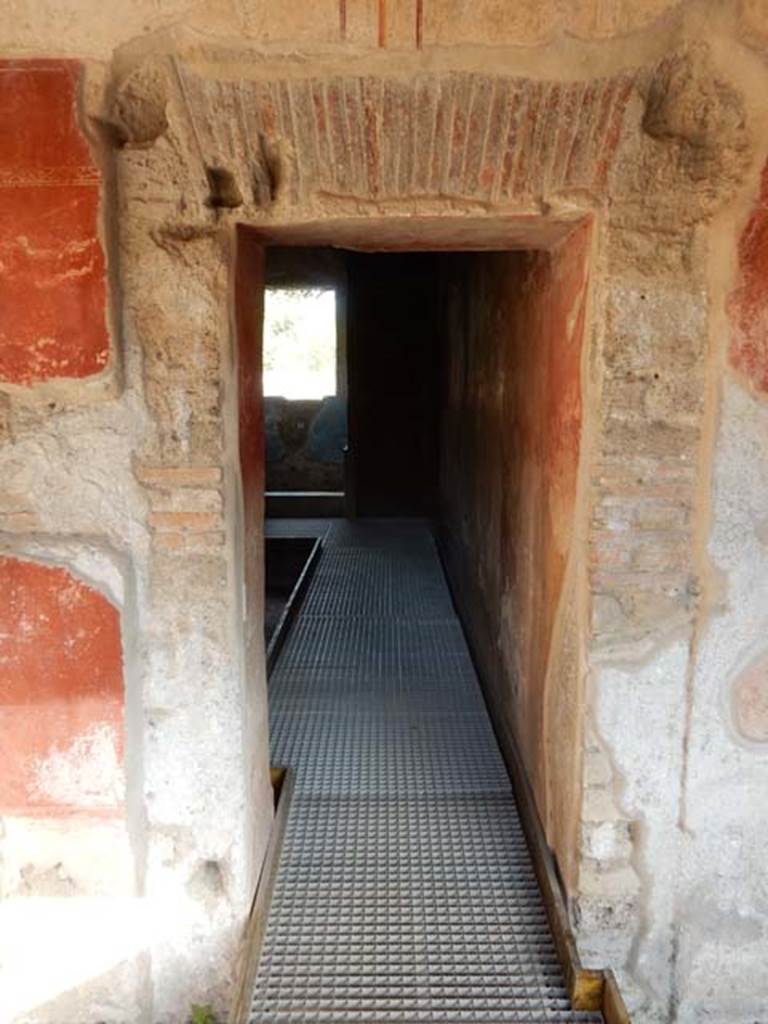 II.4.6 Pompeii. May 2017. Doorway to apodyterium, looking south in south-east corner of portico. Photo courtesy of Buzz Ferebee.
