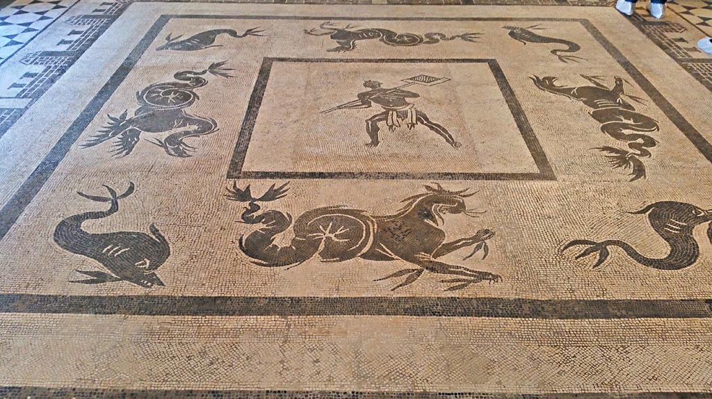 II.4.6 Pompeii. Black and white mosaic showing a furnaceman and a marine scene set in floor of Naples Museum.