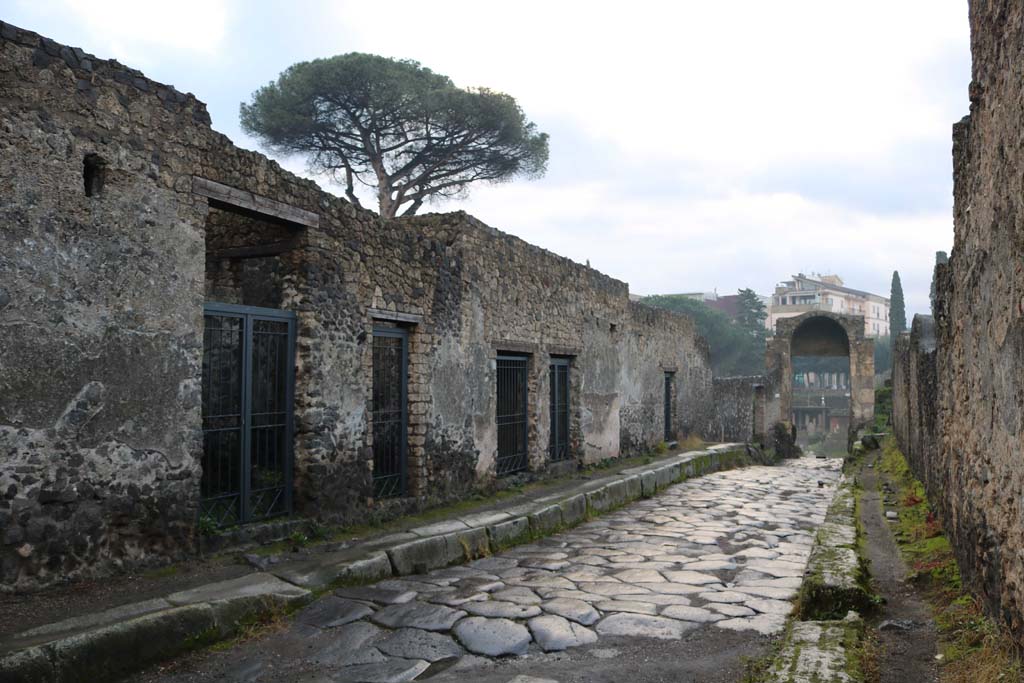 Via di Nocera, Pompeii. December 2018. Looking south along east side, with doorway to II.8.5, on left. Photo courtesy of Aude Durand.