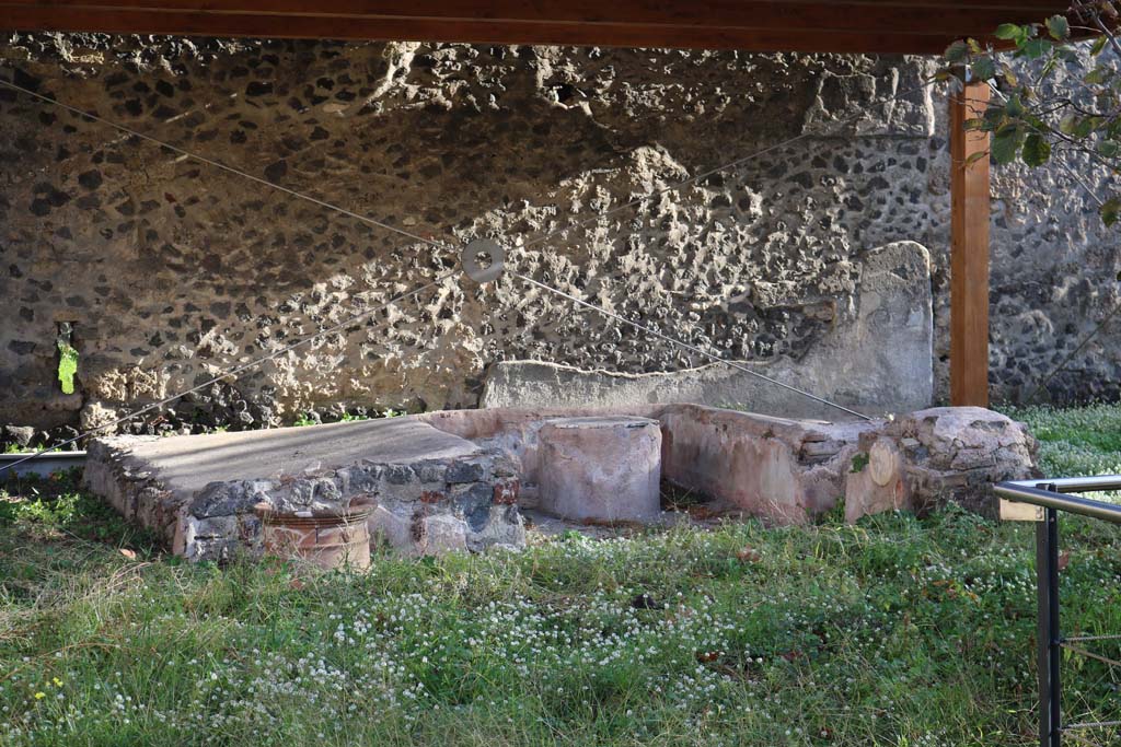 II.9.4 Pompeii. December 2018. Looking east to triclinium against rear wall in garden area 9. Photo courtesy of Aude Durand.