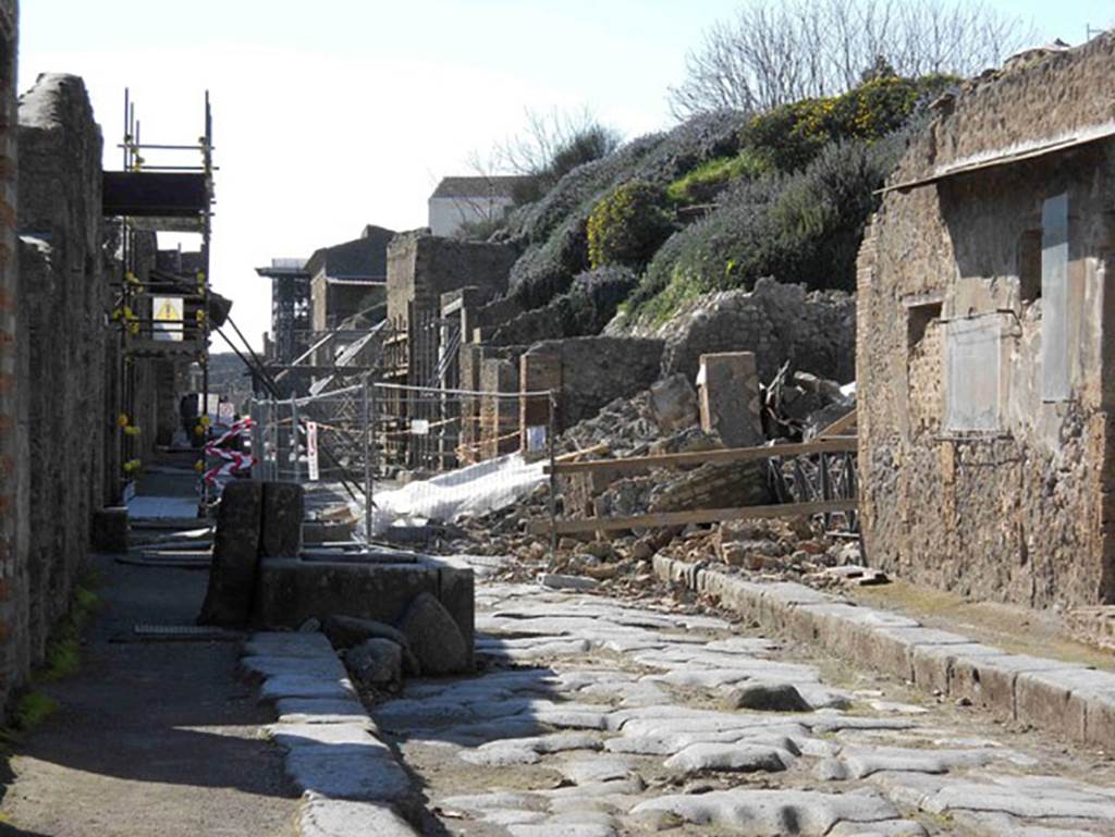III.4.1 Pompeii. February 2011.
Looking west along Via dellAbbondanza to III.4.1 and III.3.6. Photo courtesy of Guy de la Bedoyere.
