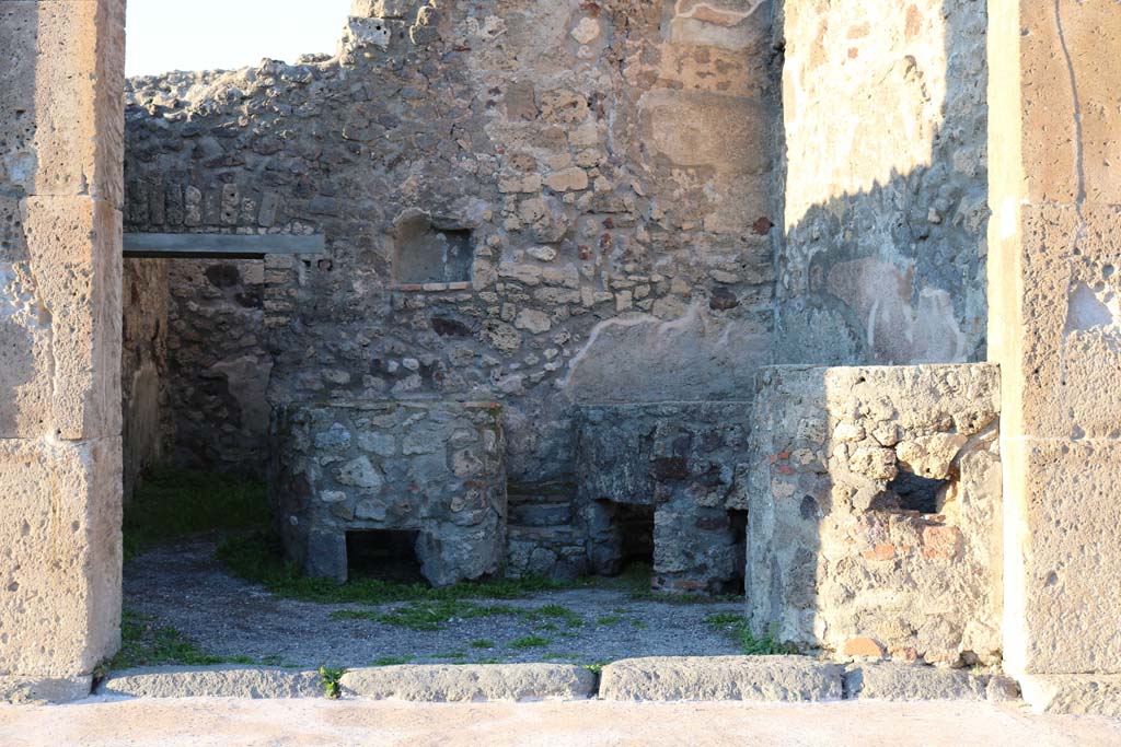 V.1.5 Pompeii. December 2018. Entrance doorway on Via di Nola, looking north towards rear room. Photo courtesy of Aude Durand.
