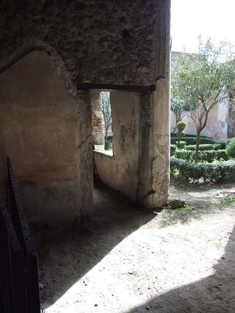 V.1.26 Pompeii. March 2009. 
Room “s”, looking towards doorway to room on east side of peristyle garden. 

