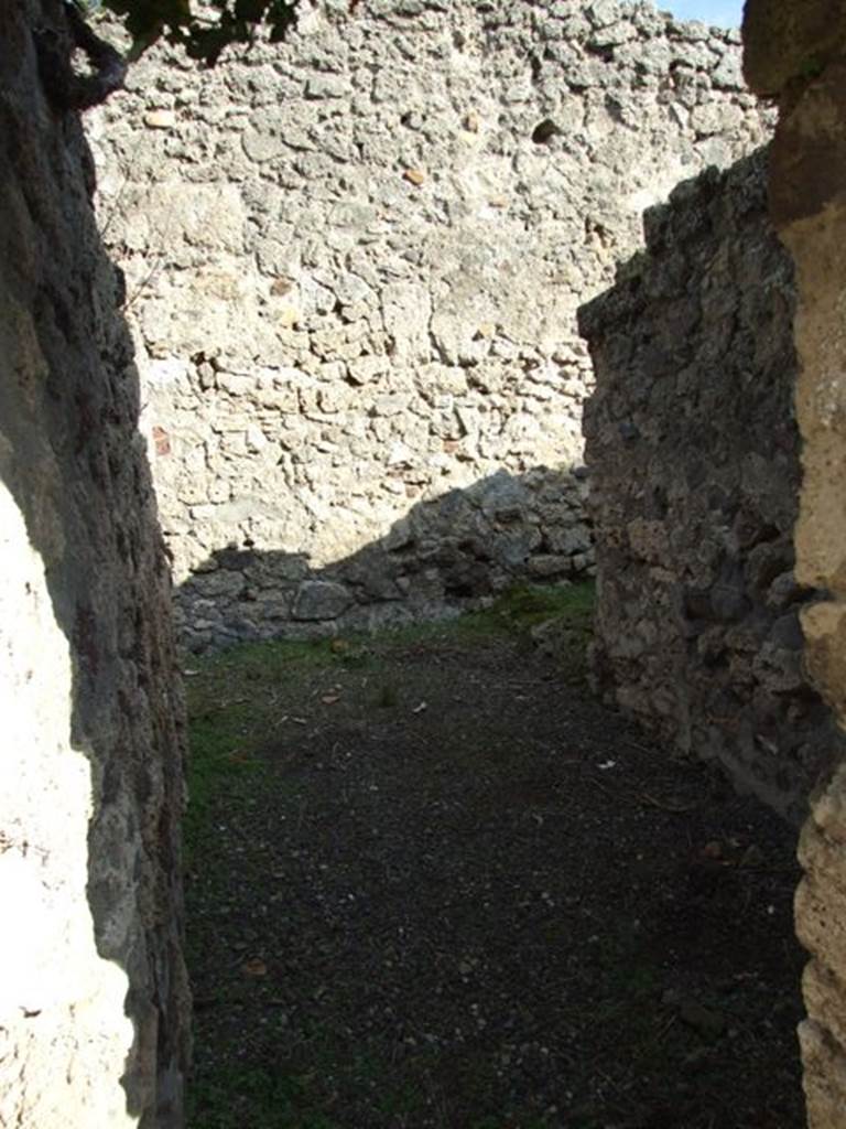 V.2.10 Pompeii. December 2007. Doorway to room 10. According to NdS, this rustic area was probably the kitchen, which led to a latrine.

