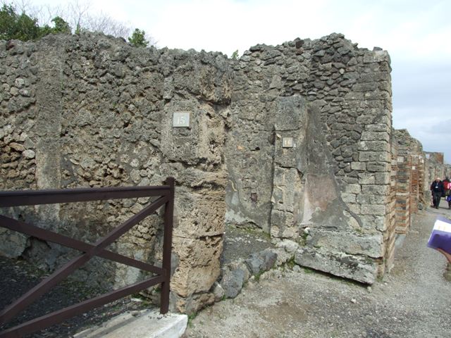V.2.16 Pompeii. March 2009. Looking north across shop. The outline of the wooden stairs can be seen on the east wall.