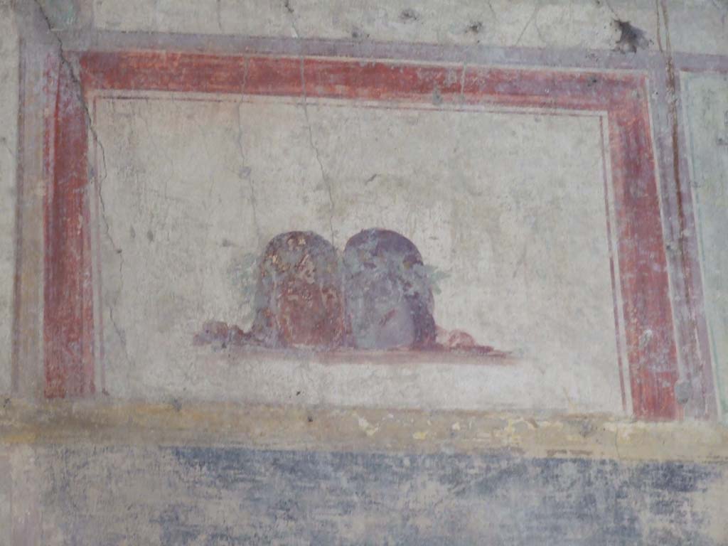 V.2.i Pompeii. December 2007. Room 23, painted masks on south side of Rhodian peristyle.  