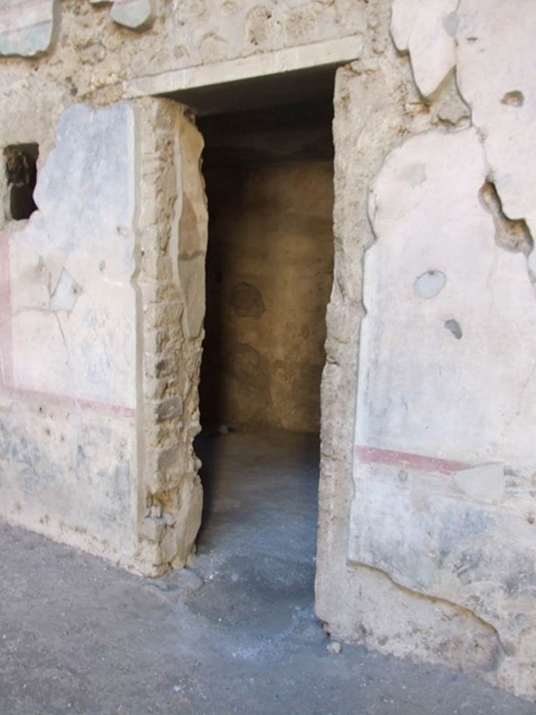 V.2.i Pompeii. March 2009.  Doorway to Room 2c, on west side of atrium.