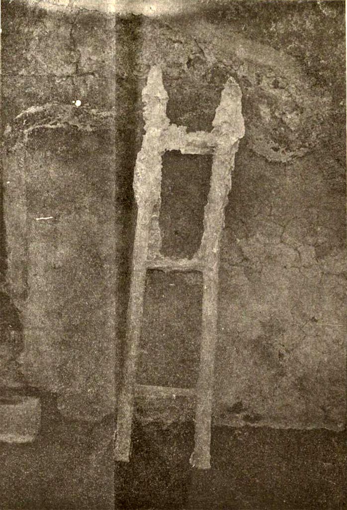 V.3.12 Pompeii. Upon excavating the andron in December 1902 the following plaster casts were made. 
- an internal fascia of the entrance doorway 
- a bar of wood with which one reinforced the doorway when it was closed
- a ladder (shown in the photo above). 
According to Sogliano, it must be recorded that the ladder was the first of its type to be cast. 
Sogliano said this was due to the diligence of Della Corte.
See Notizie degli Scavi di Antichità, 1905, p. 214 fig. 5.
