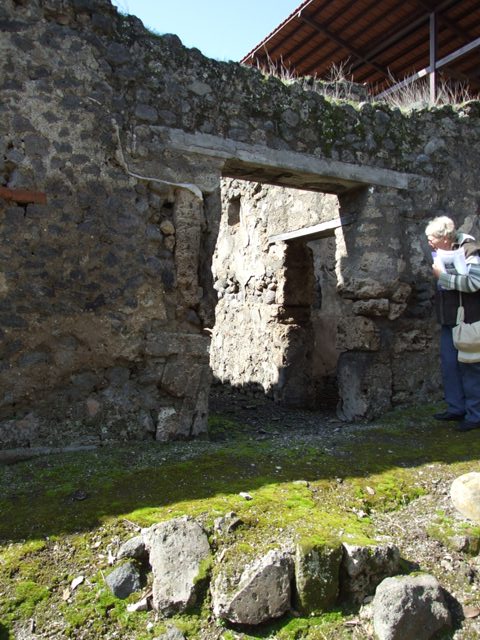 V.4.10 Pompeii.    March 2009. North west corner of Latrine and dog kennel. 