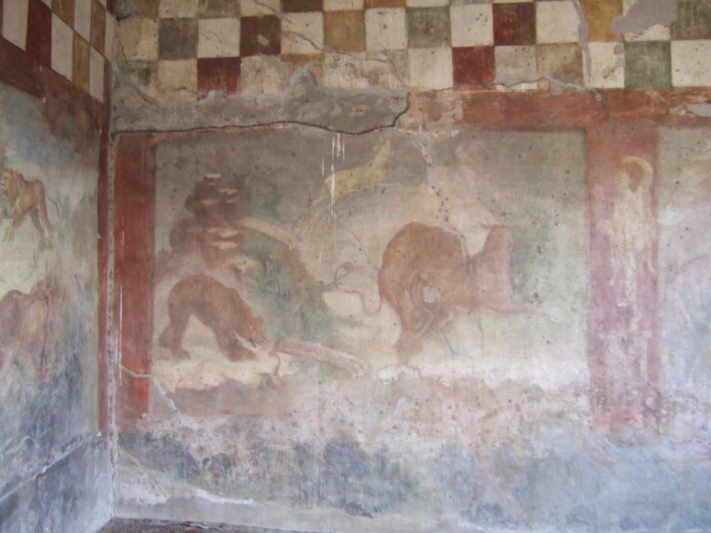 V.4.a Pompeii. May 2006. Room ‘l’ (L), hunting fresco with life-size animals on east wall of garden area.