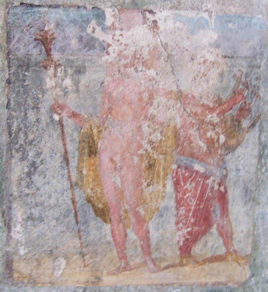 V.4.a Pompeii.  May 2006. Summer triclinium, east wall.  Close up of the wall painting of Dionysus (Bacchus) accompanied by Silenus playing the lyre. See Nappo, S., 1998. Pompeii: Guide to the lost City.  London: Weidenfield and Nicolson. (p. 126).
