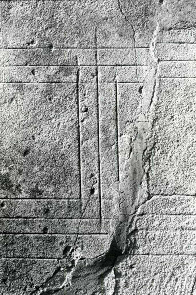 V.5.2 Pompeii. 1975. House without Compluvium, cubiculum d, detail of incision.  
Photo courtesy of Anne Laidlaw. American Academy in Rome, Photographic Archive. Laidlaw collection _P_75_7_25.
