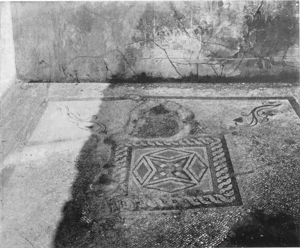 V.5.3 Pompeii. c.1930. Room 14, looking across flooring towards east wall of cubiculum.
Black and white mosaic with polychrome tesserae, the central emblema consists of a rose inserted into a star, delimited by four polychrome diamonds set into a square, within a black border with braid design. 
See Blake, M., (1930). The pavements of the Roman Buildings of the Republic and Early Empire. Rome, MAAR, 8, (p.76,118 & Pl.42, tav.2)
