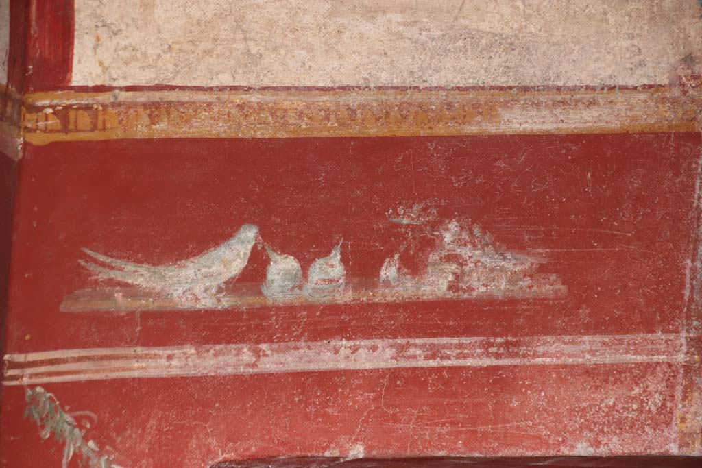 V.6.12 Pompeii. October 2020. Detail of painting from zoccolo/dado on east wall. Photo courtesy of Klaus Heese.