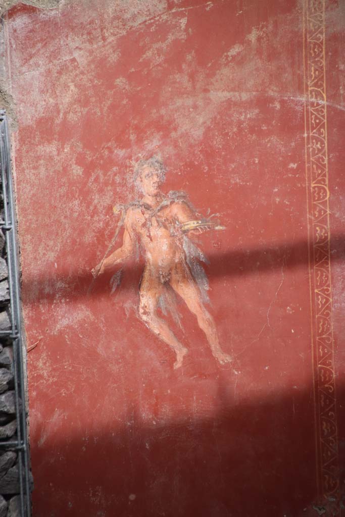 V.6.12 Pompeii. October 2020. Atrium, red panel with flying figure.  Photo courtesy of Klaus Heese.
