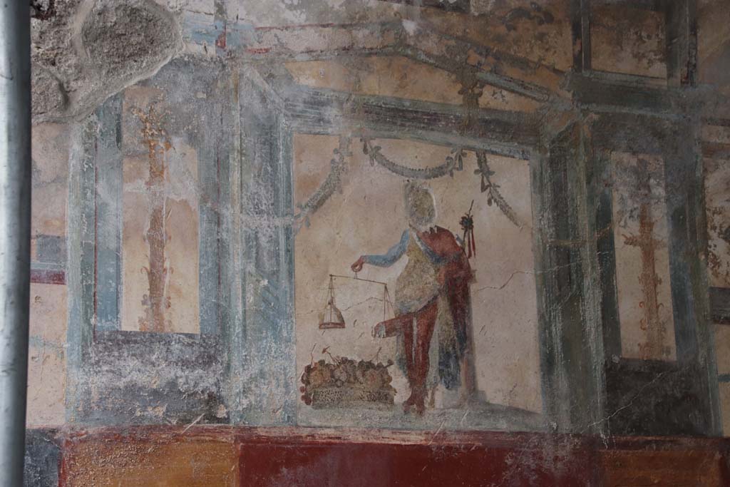 V.6.12 Pompeii. September 2021.  
Detail of Priapus from upper north wall of entrance fauces. Photo courtesy of Klaus Heese.
