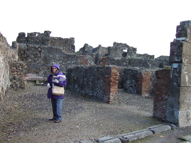 VI.1.14 Pompeii. September 2004. Looking east across main room to rear.

