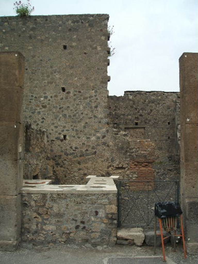 VI.2.1 Pompeii. May 2005. Entrance doorway, looking east across Via Consolare.  