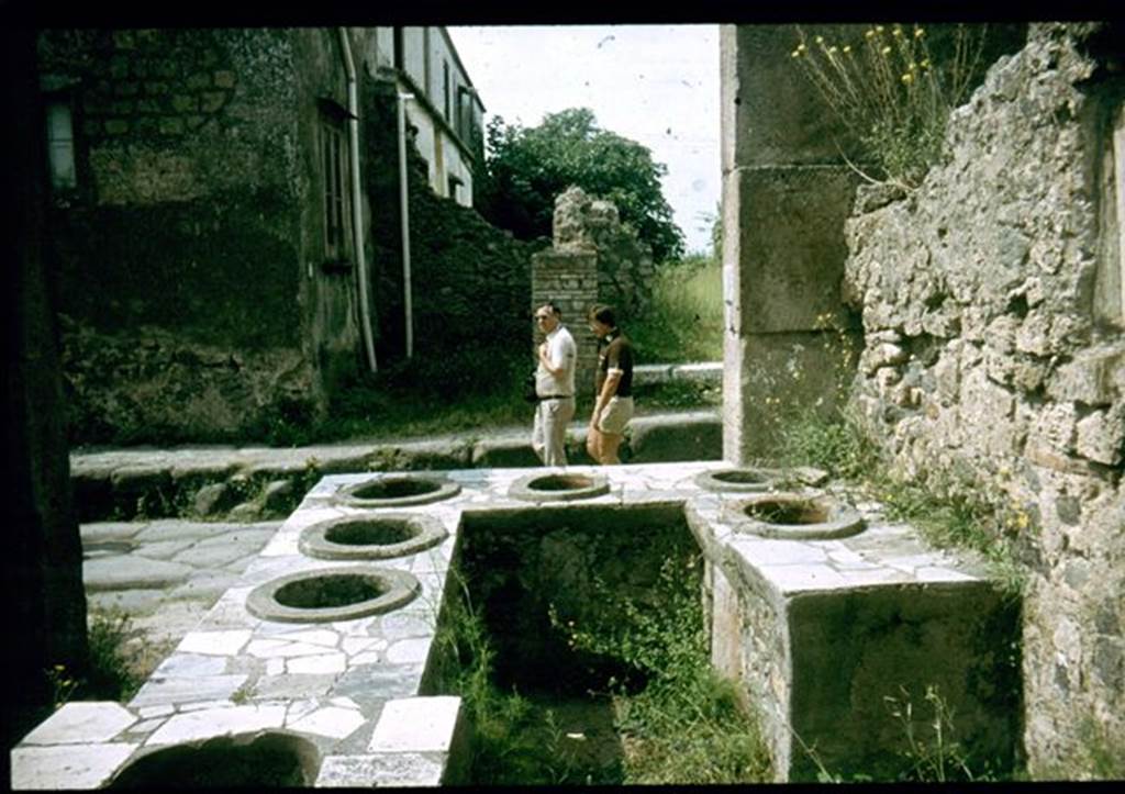 VI.2.1 Pompeii.  Looking from rear of counter onto Via Consolare.  Photographed 1970-79 by Günther Einhorn, picture courtesy of his son Ralf Einhorn.
