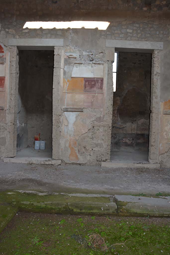 VI.2.4 Pompeii. March 2019. 
Looking towards north side of atrium with doorway to first cubiculum, on left of painted pilaster, and to second cubiculum, on right.
Foto Annette Haug, ERC Grant 681269 DÉCOR.
