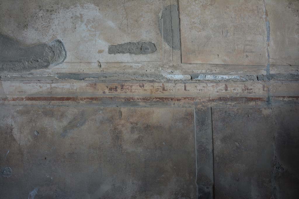 VI.2.4 Pompeii. March 2019. North wall of oecus, with remaining painted decoration above zoccolo.
Foto Annette Haug, ERC Grant 681269 DÉCOR.
