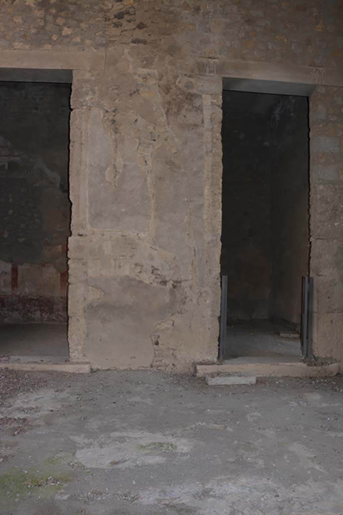 VI.2.4 Pompeii. March 2019. 
Looking towards south side of atrium towards pilaster between cubiculum, on left, and doorway to a room on east side of shop at VI.2.3.
Foto Annette Haug, ERC Grant 681269 DÉCOR.
