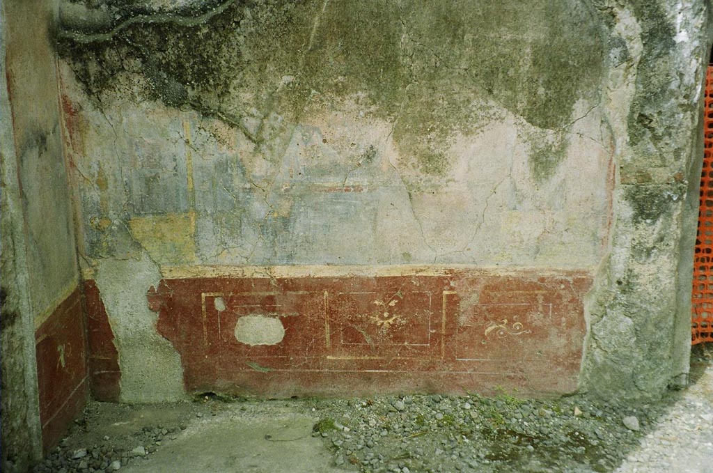 VI.2.4 Pompeii. June 2010. 
Painted plaster on west wall in south-west corner between the diaeta and the triclinium. Photo courtesy of Rick Bauer.
