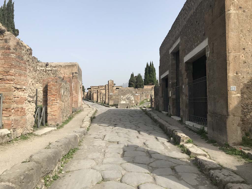 VI.2.4, Pompeii, on right. April 2019. Looking north on Via Consolare, between VI.17.26/5, on left and VI.2.2, on right.
The House of Sallust doorways can be seen on the right, numbered VI.2.3/4/5. Photo courtesy of Rick Bauer.  
  

