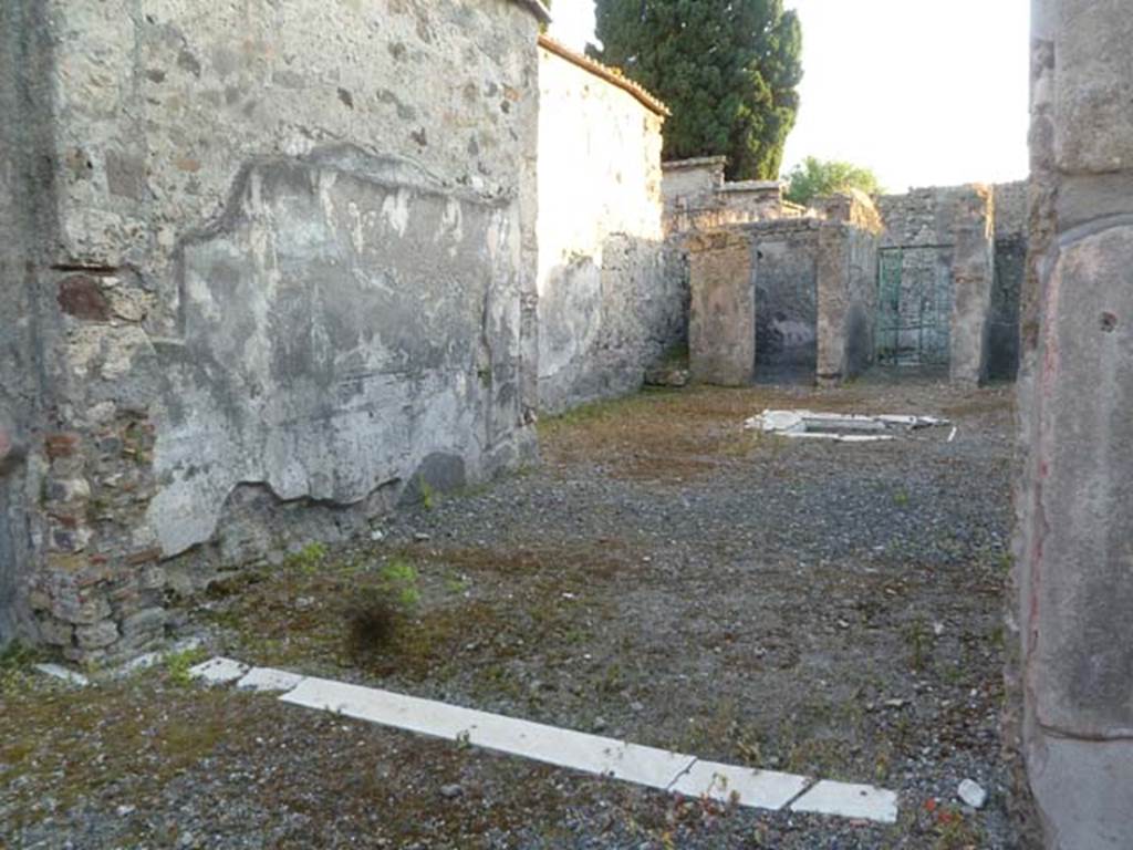 VI.2.16 Pompeii. May 2011. Looking through tablinum towards south-west corner of atrium, with stairs, cubiculum and entrance corridor visible.