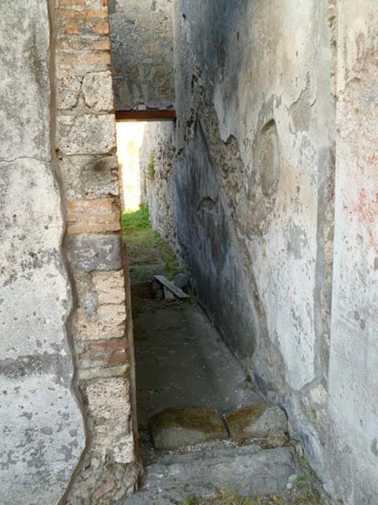 VI.2.16 Pompeii. May 2011. Looking east into area with stairs to upper floor, and storeroom below.