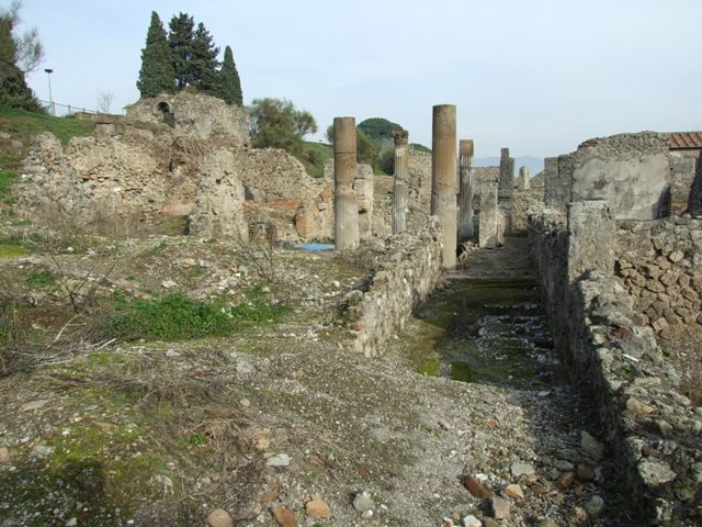 VI.2.18 Pompeii. September 2005. Looking east along prothyron near south wall, showing floor of lower level.
