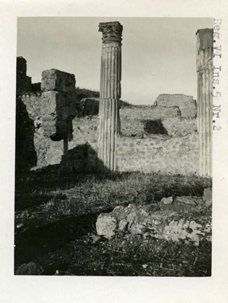 VI.2.18 Pompeii but shown as VI.5.2 on the photo. 1937-39.
Looking east towards columns, across the garden area towards the atrium and entrance doorway.
In the distance are the walls of VI.5.2. 
Photo courtesy of American Academy in Rome, Photographic Archive. 
Warsher collection no. 1845.

