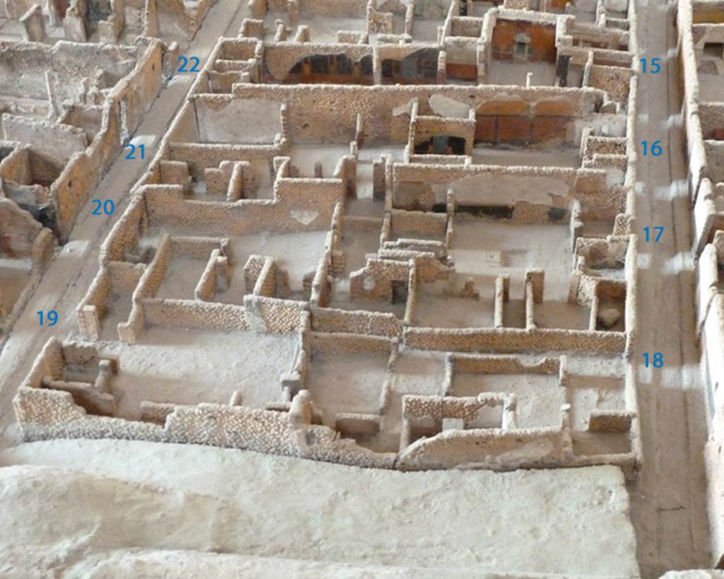 VI.2, Pompeii. North end of insula as on model in Naples Archaeological Museum. VI.2.19/18 directly next to the city walls are shown at the lower part of the photo.
