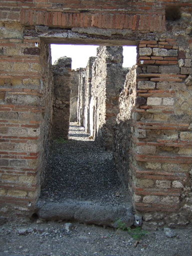 VI.2.21 Pompeii. September 2005. Looking west through rear posticum doorway.