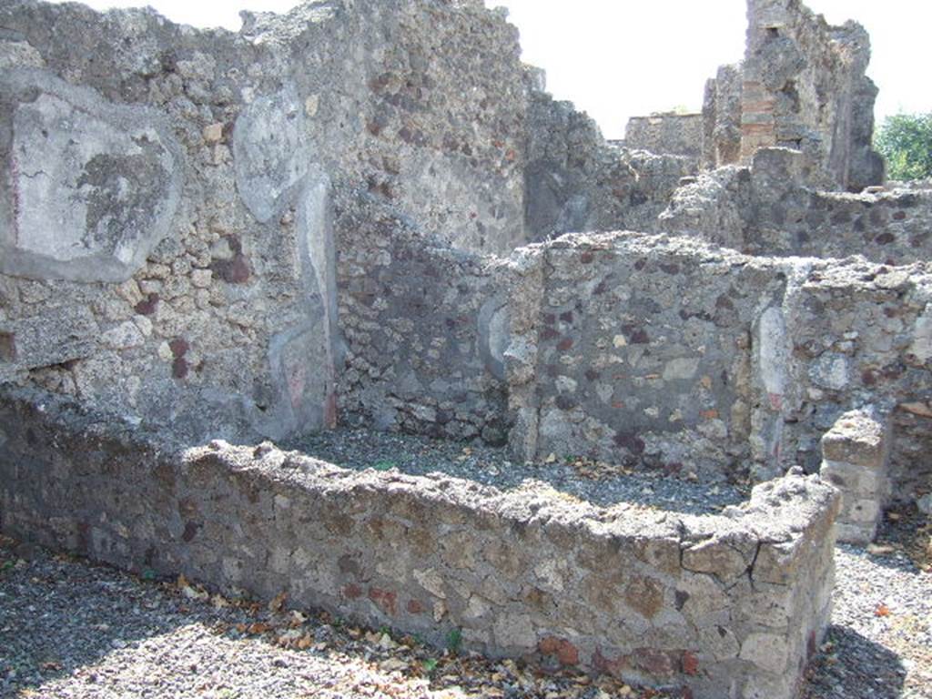 VI.2.27 Pompeii. September 2005.  West wall of triclinium, with small cubiculum with antechamber on its west side.

