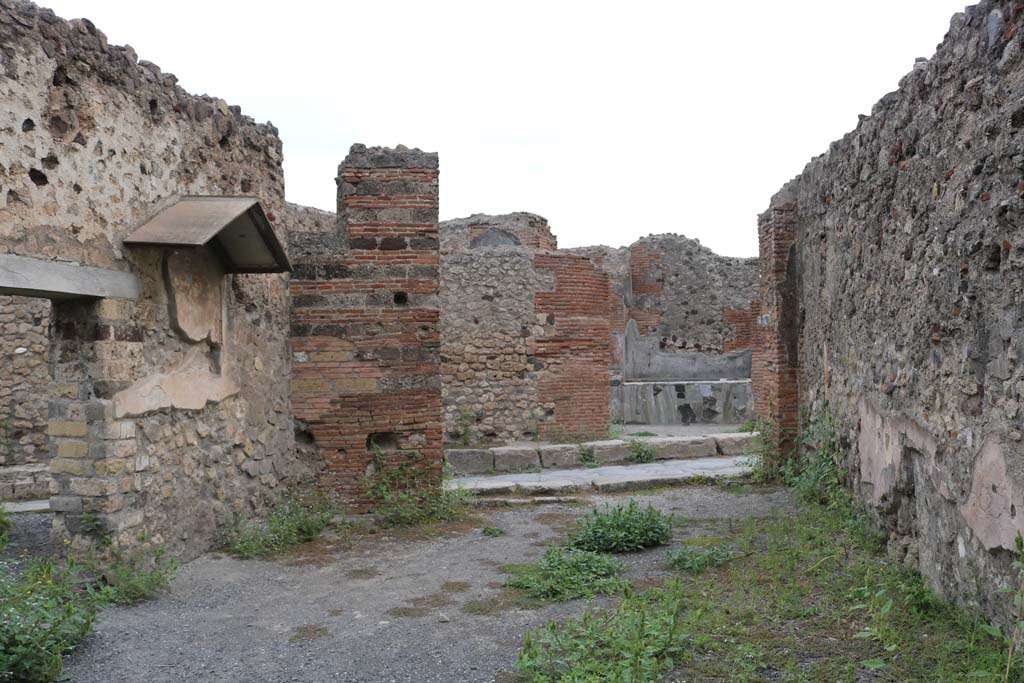 VI.4.4 Pompeii. December 2018. 
Looking east across bar-room towards entrance doorway on Via Consolare. Photo courtesy of Aude Durand.
