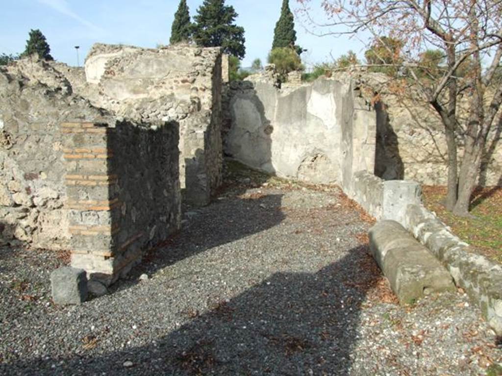 VI.5.4 Pompeii. December 2007. Room 7, walkway at rear of tablinum, looking north.  According to Fiorelli, this was a covered walkway supported by two columns, overlooking the garden. This walkway lead to an oecus and two repositories, one above the other. See Pappalardo, U., 2001. La Descrizione di Pompei per Giuseppe Fiorelli (1875). Napoli: Massa Editore. (p.54)


