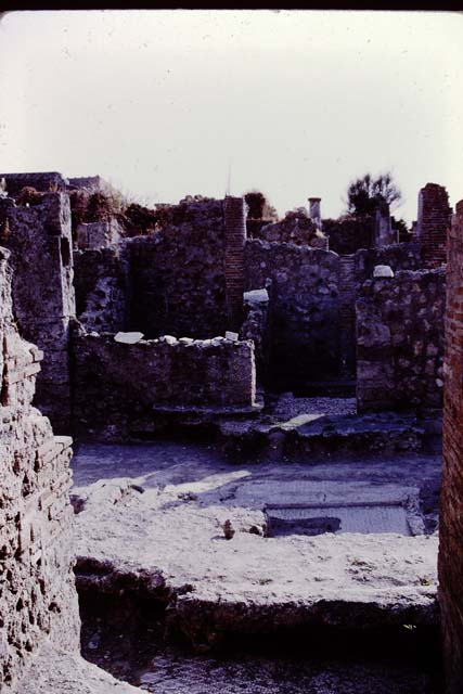 VI.5.19 Pompeii. September 2005. Looking south-east to room in corner of atrium.