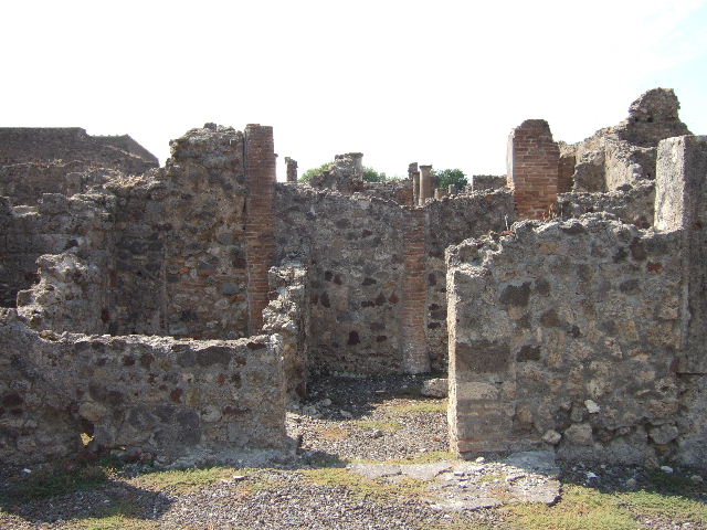 VI.5.9 Pompeii. May 2011. Looking towards south-west corner of area on south side of atrium. (For other photographs, see VI.5.9 and VI.5.10)