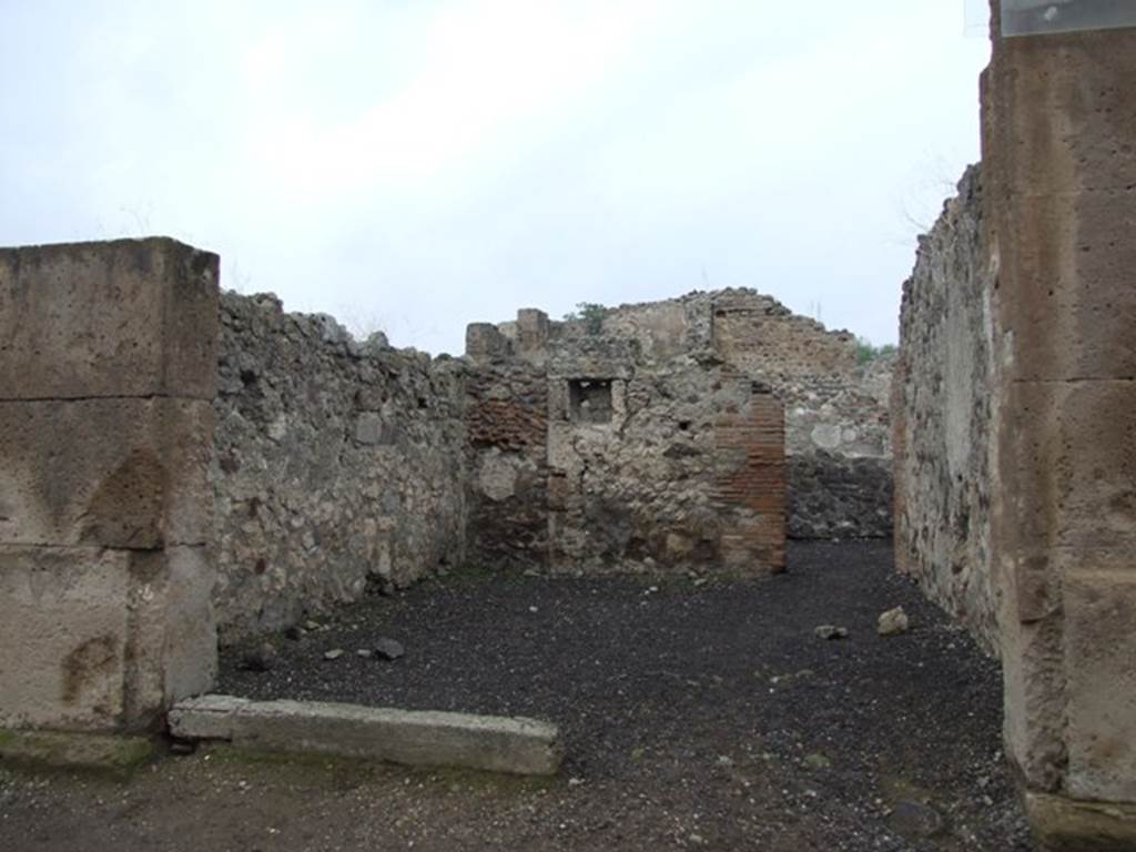 VI.6.3 Pompeii. December 2006. Looking north towards niche in rear wall and doorway to small room at rear.