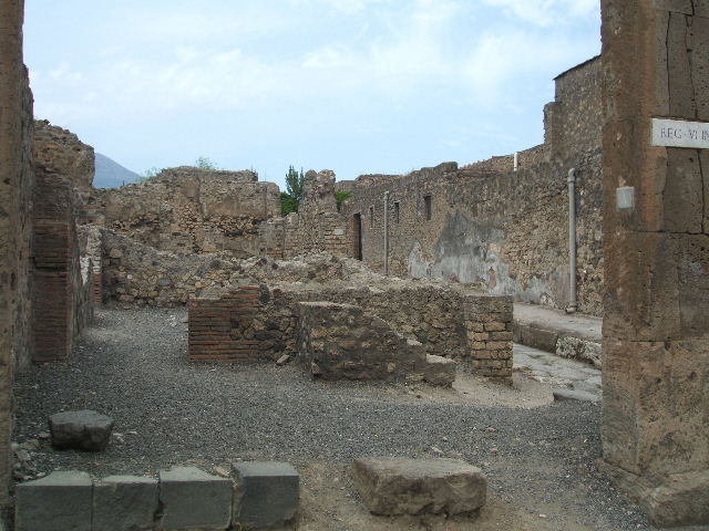 From VI.6.4 looking south at VII.5.8, on opposite side of Via delle Terme. May 2005.