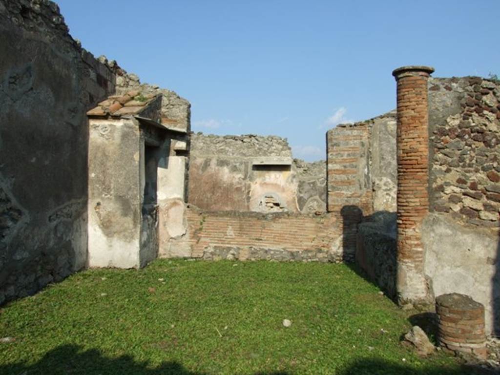 VI.7.6 Pompeii. March 2009. Room 6, looking east across garden area towards window of the triclinium.