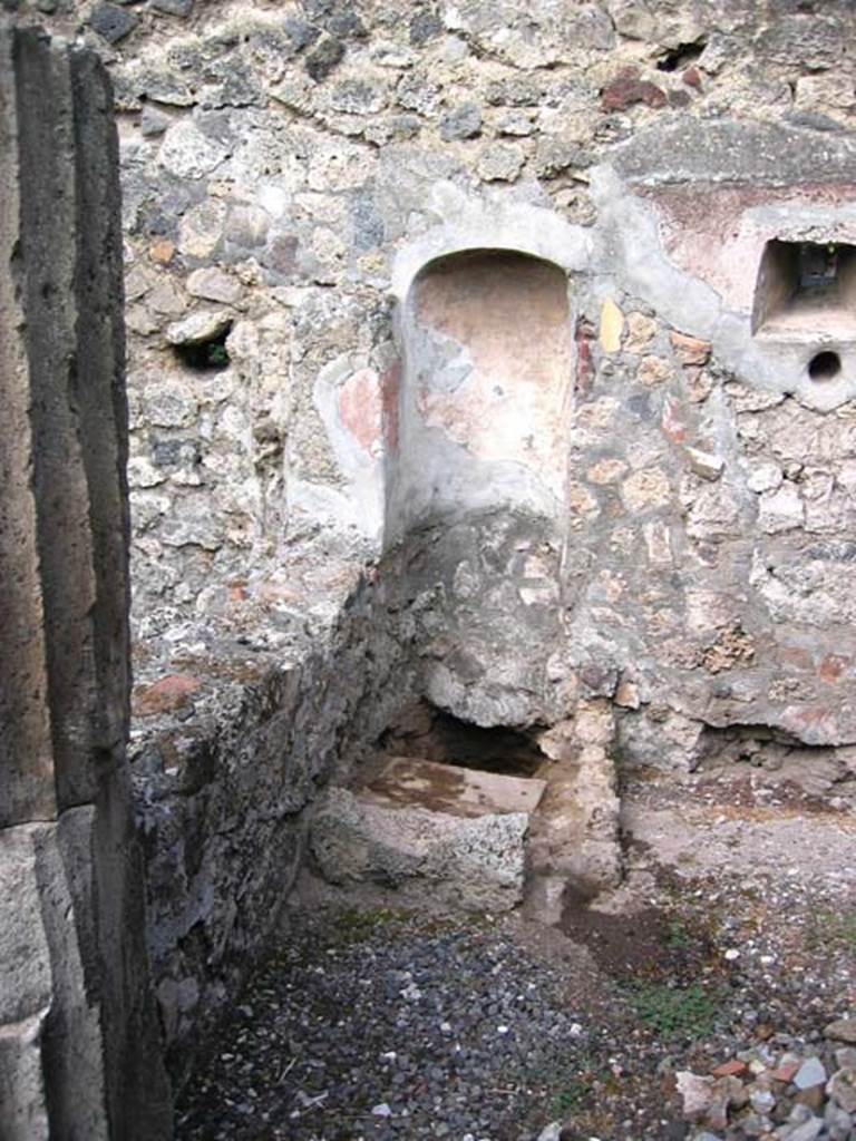 VI.7.19 Pompeii. August 2005. Kitchen with niche latrine. Photo courtesy of Barry Hobson.