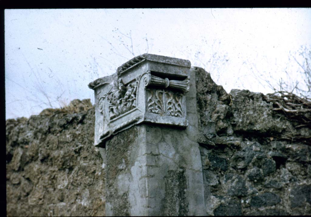 VI.7.25 Pompeii. Decorative capital on north side of entrance doorway. Looking north-west from Via Mercurio. 
Photographed 1970-79 by Günther Einhorn, picture courtesy of his son Ralf Einhorn.
