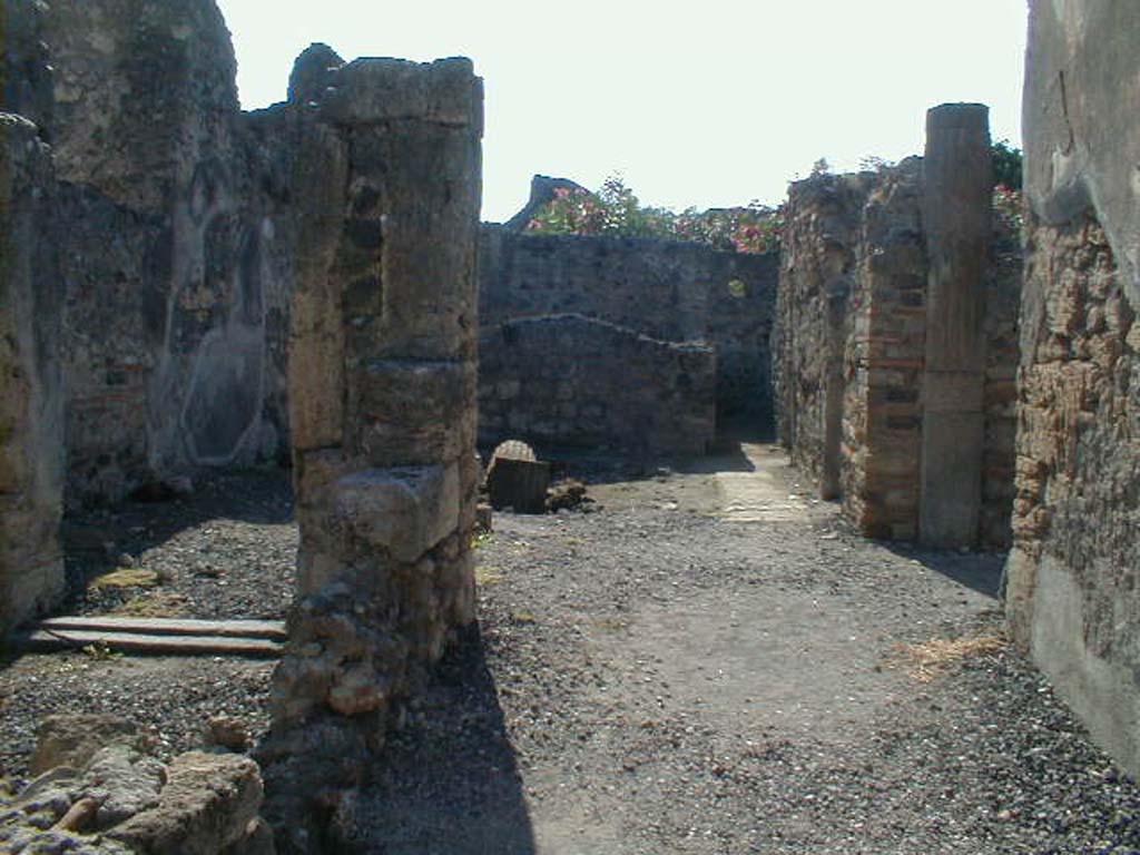 VI.7.25 Pompeii. September 2004. Looking west from wide entrance fauces.