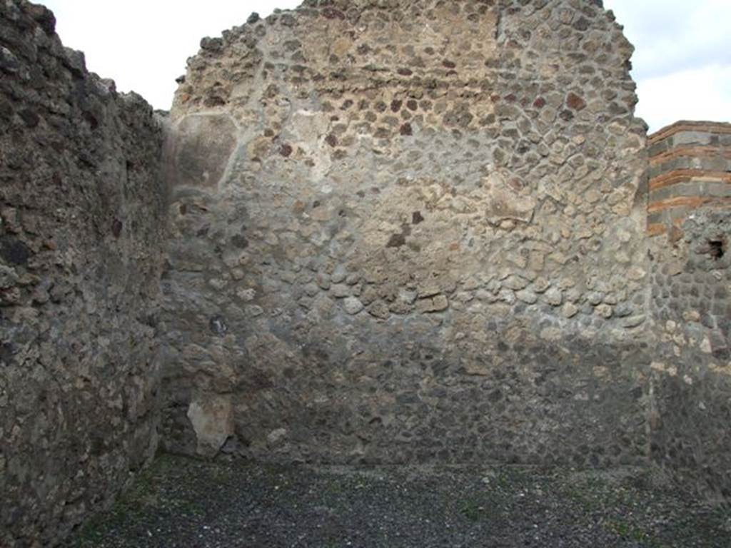 VI.8.11 Pompeii. December 2007. North wall of rear room. According to Eschebach, on the right would have been the base of the stairs to the upper floor with three steps remaining! See Eschebach, L., 1993. Gebudeverzeichnis und Stadtplan der antiken Stadt Pompeji. Kln: Bhlau. (p.184)
