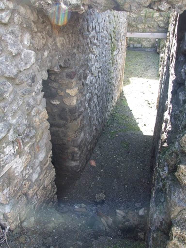 VI.8.22 Pompeii.  March 2009.  Looking west to lower level and door of Room 7.