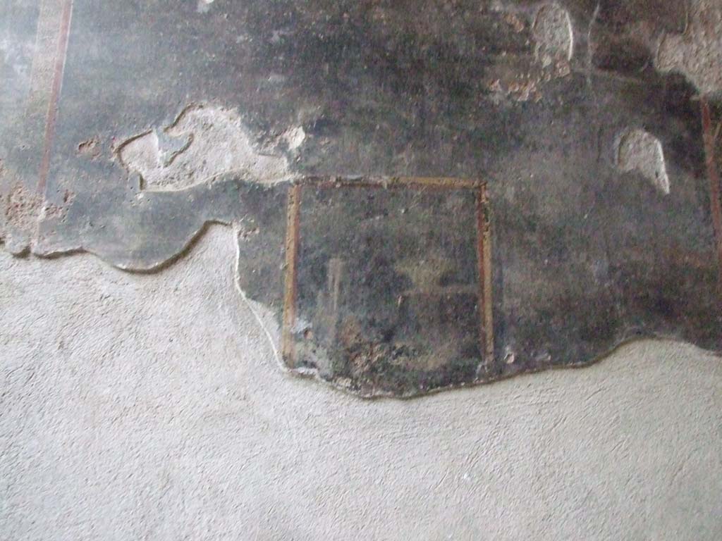VI.8.23 Pompeii. December 2006. Detail of painted plaster at north end of garden, on west wall in north portico.